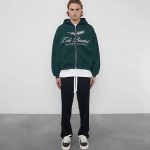 INTERNATIONAL ZIPPED GREEN HOODIE