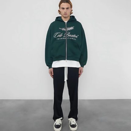 INTERNATIONAL ZIPPED GREEN HOODIE